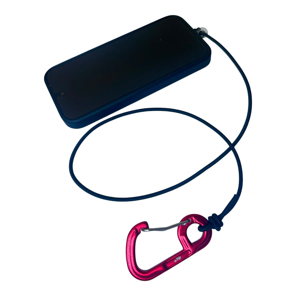 Leash téléphone Oops! : smartphone relié au cordon élastique et mousqueton rouge